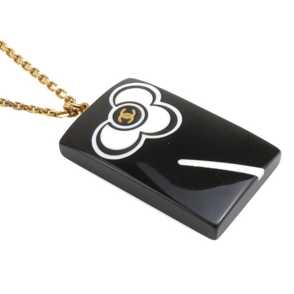 CHANEL Black and Gold Floral Pendant Necklace